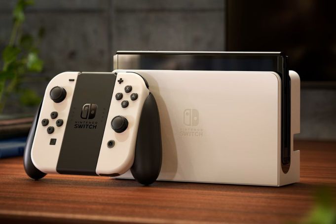 Nintendo Switch OLED in white (lifestyle photo)
