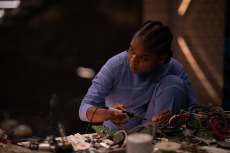 Dominique Thorne as Riri Williams in Marvel Studios' BLACK PANTHER: WAKANDA FOREVER. Photo by Eli Adé. © 2022 MARVEL.