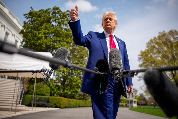WASHINGTON, DC - APRIL 3: U.S. President Donald Trump gestures to members of the media before boarding Marine One on the South Lawn of the White House on April 3, 2025 in Washington, DC. Trump spoke a day after announcing sweeping new tariffs targeting goods imported to the U.S. on countries including China, Japan and India.(Photo by Andrew Harnik/Getty Images)